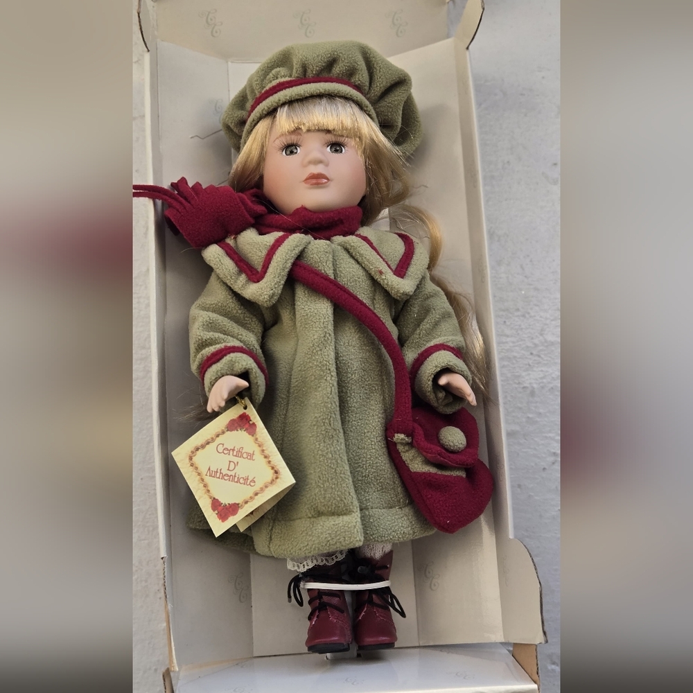 Charming Doll with Olive Coat and Burgundy Accessories